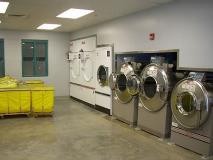 Inmate workers work various shifts to ensure all clothing and bedding is washed, dried, and neatly folded for re-issue. The laundry room processes approximately 965,550 pounds of laundry each year.
