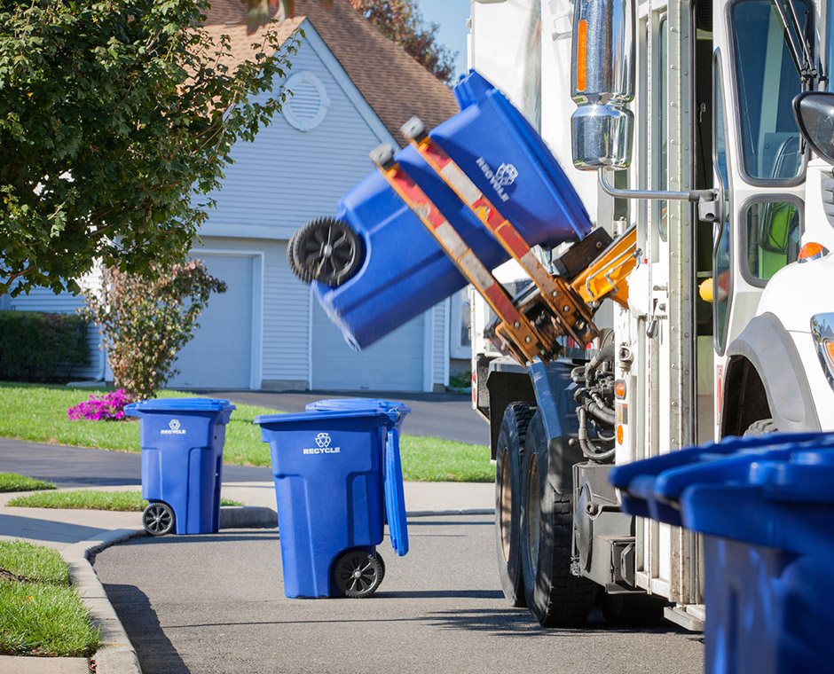 recycling truck emptying out garbage