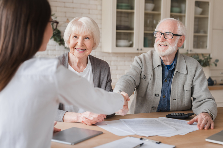 husband and wife meeting to go over documents